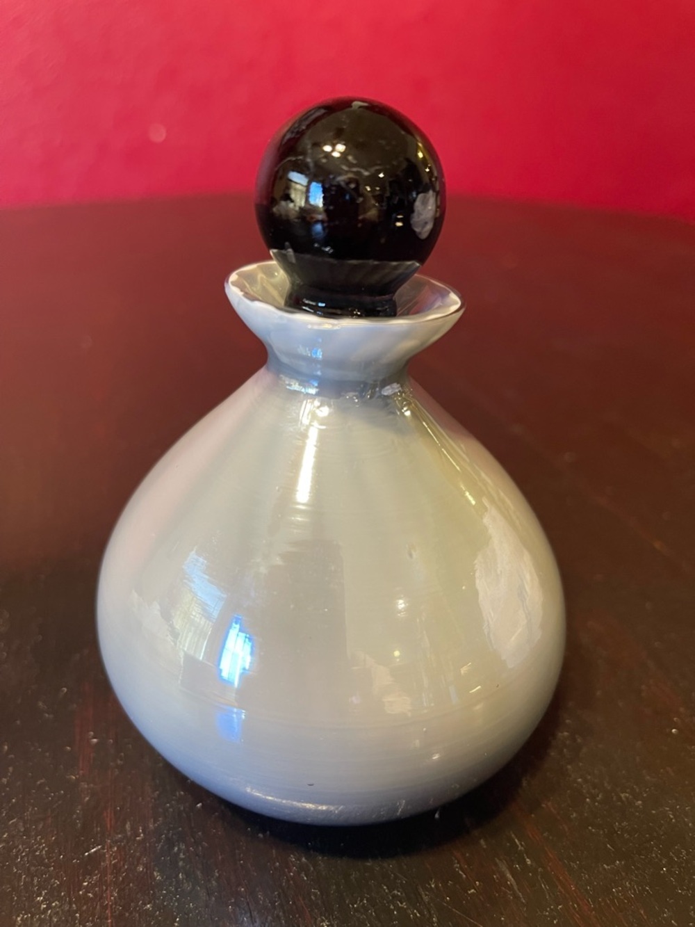 Hand-Blown Glass Accent Bottle in Light Gray with Black Stopper